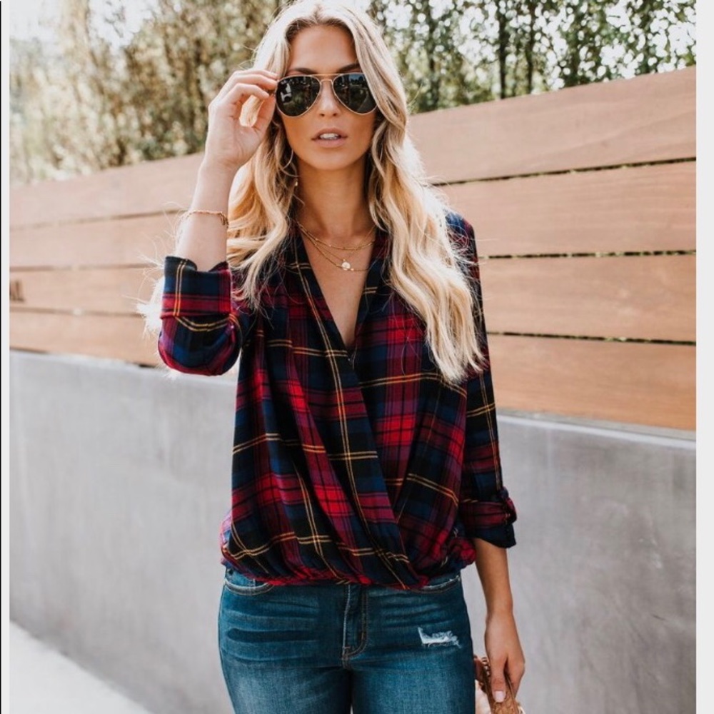 On trend faux wrap plaid top